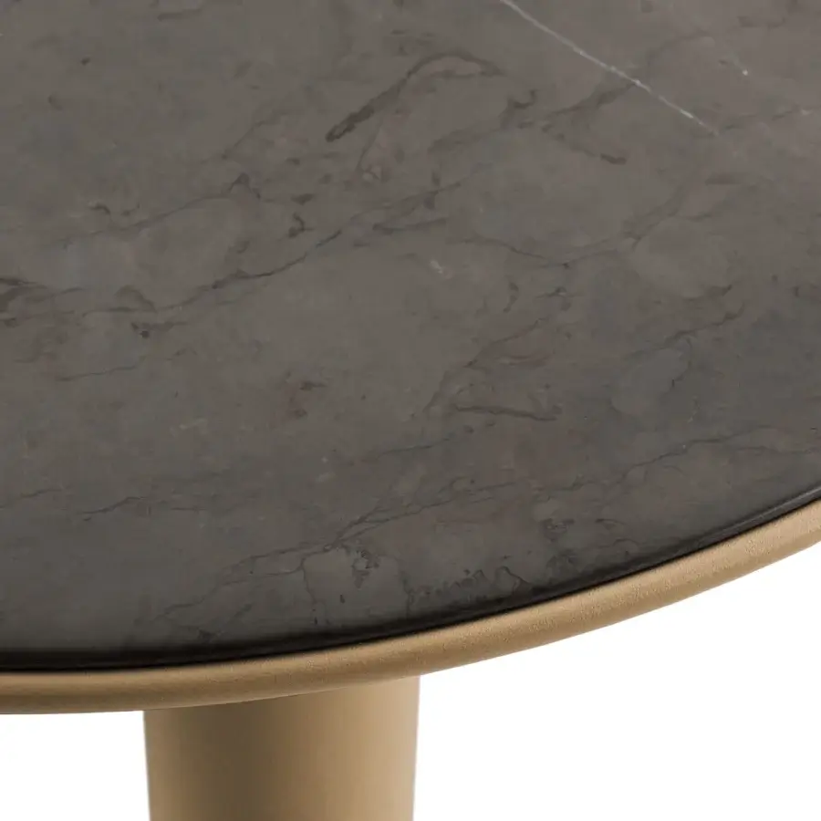 Distinguished Turri Riban coffee table with rounded form, dark marble-like composite and leather piping around the perimeter