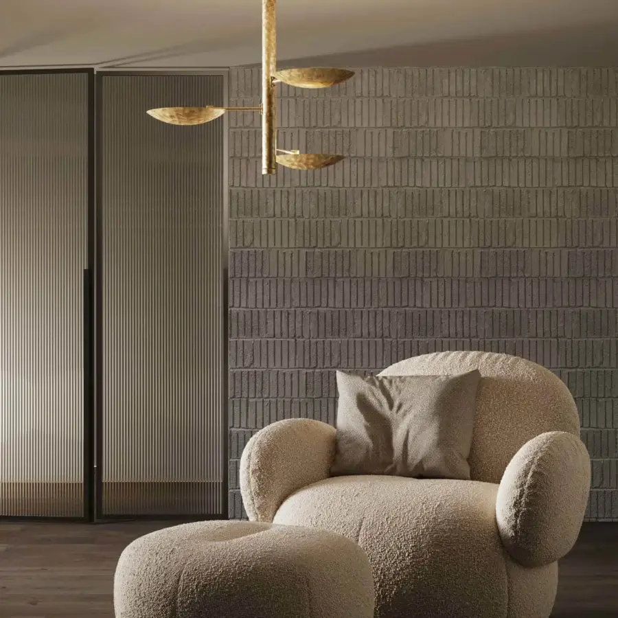 Superior Stillux Triad ceiling lamp with a hammered metal cylindrical structure and concave plates in warm gold tones