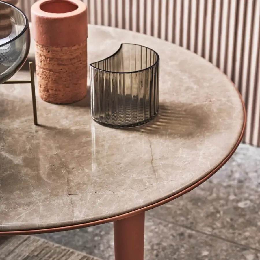 Distinguished Turri Riban side table with beige-grey marble top and copper-colored leather detailing throughout its form