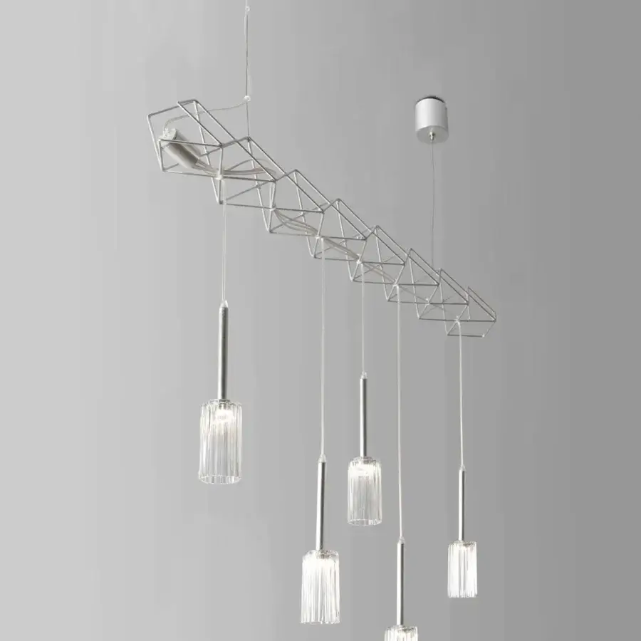 Elegant Stillux Flow suspension lamp with a rectilinear metal frame and five transparent glass pendants exhibiting fluted textures