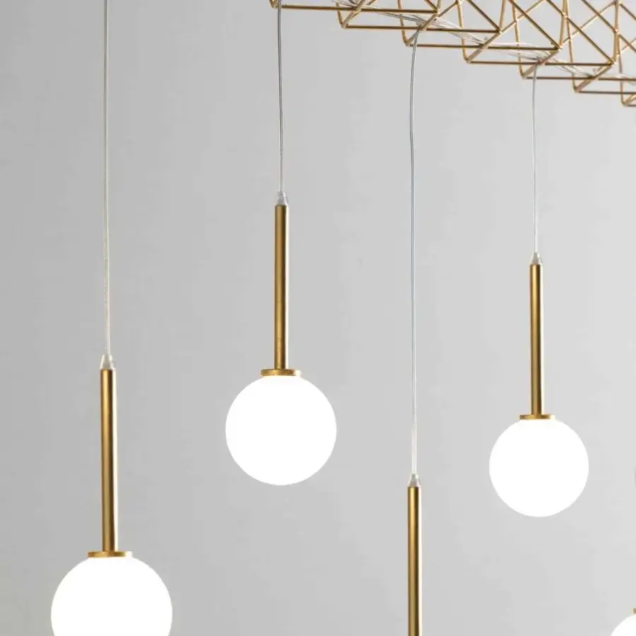 Distinguished Stillux Flow suspension lamp with six pendants and matt white glass lampshades in a golden geometric structure