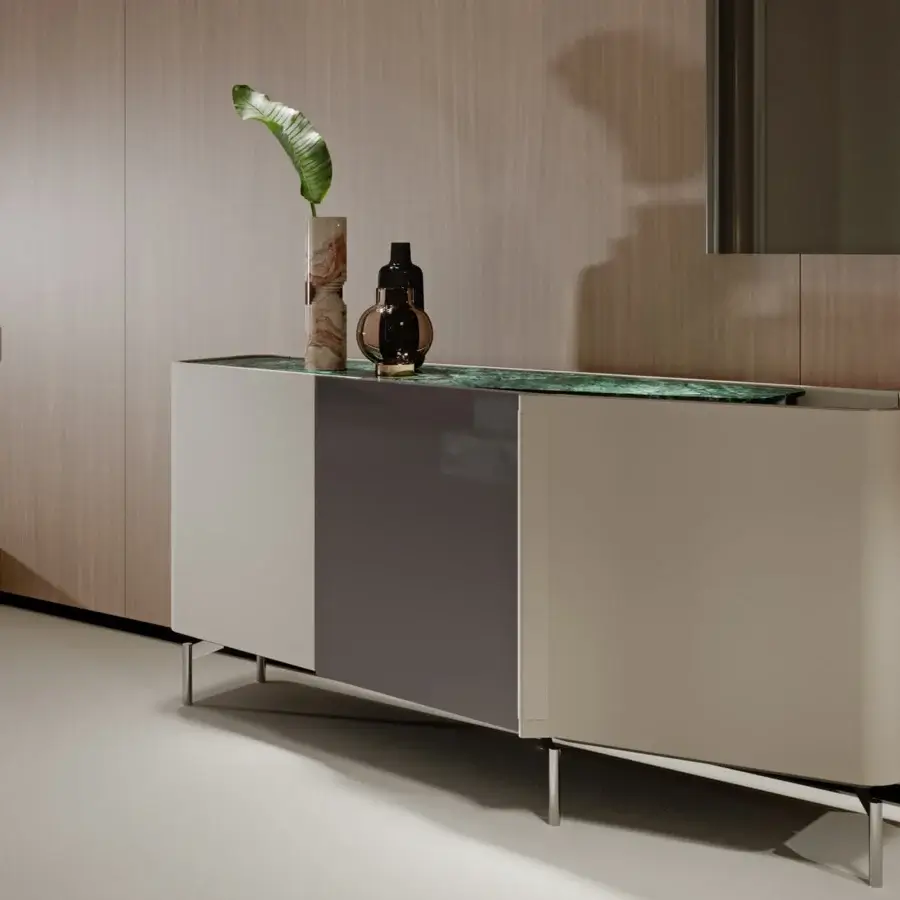 Superior Turri Zenit sideboard with curved light beige leather doors, dark grey wood, and a green marble-like double top built on polished metal legs