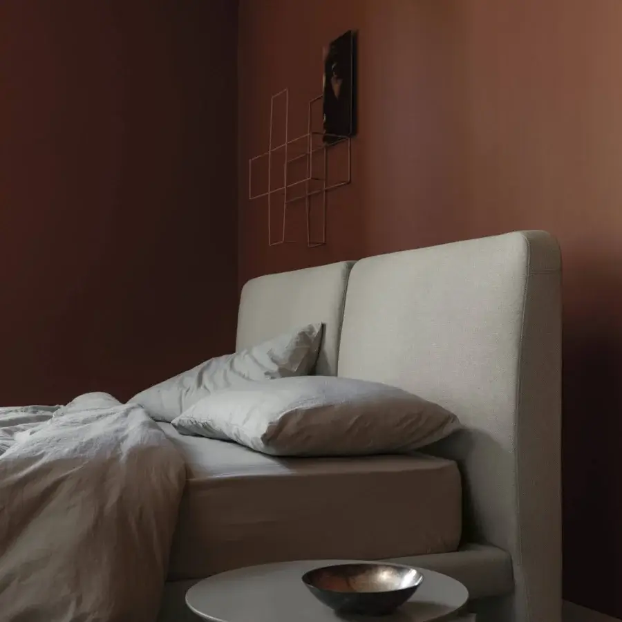Superior Bolzan Letti Feel bed with a double headboard upholstered in light gray textile and matte finish