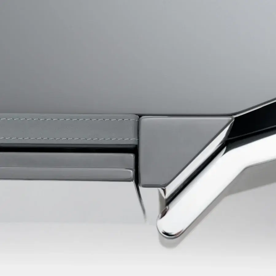 Elegant Turri Zenit TV stand with light gray lacquered wood, leather drawer and chrome metal legs