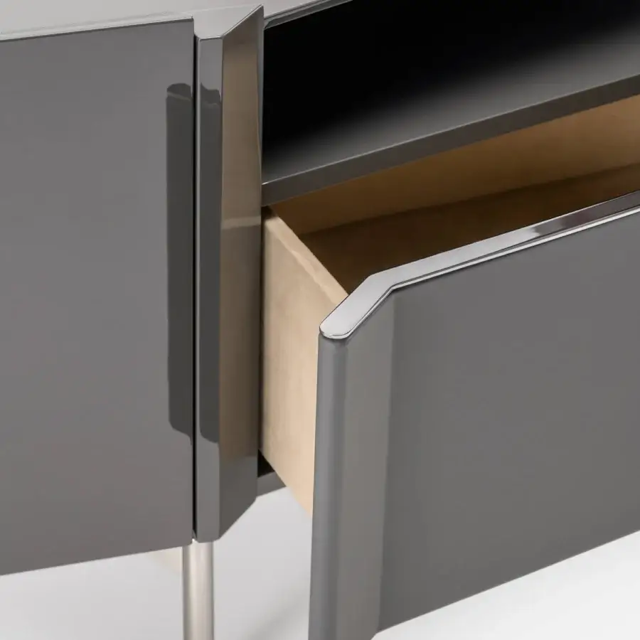 Distinguished Turri Zenit TV stand with dark gray lacquered wood, a curved leather drawer, and light metal legs