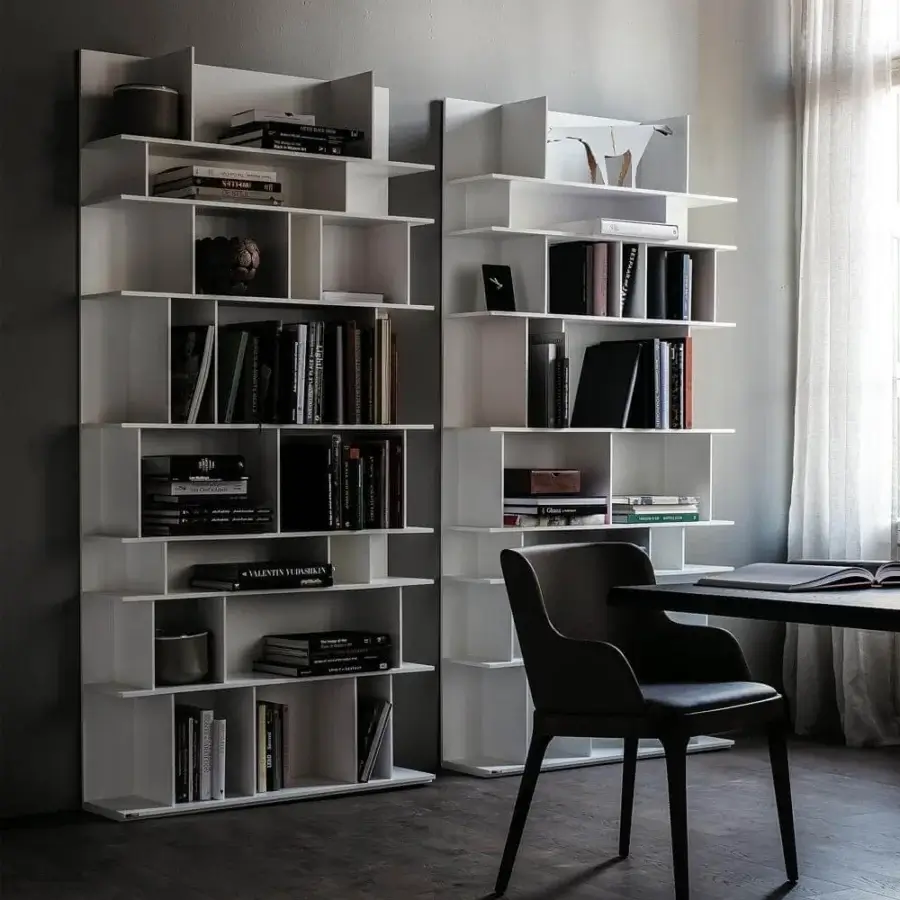 Elegant Cattelan Italia Wally bookcase crafted in matte white lacquered embossed MDF with a modern geometric form