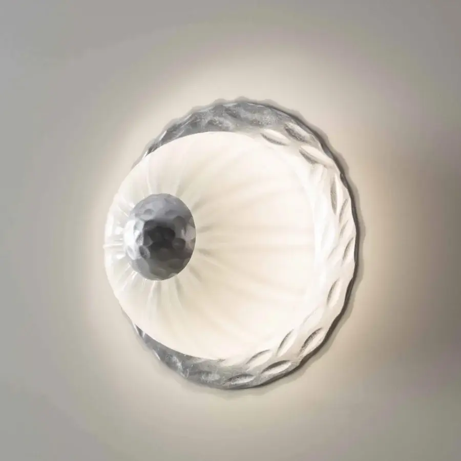 Superior Stillux Orbis wall lamp with a dark grey hammered metal structure and translucent white hand-worked glass diffuser