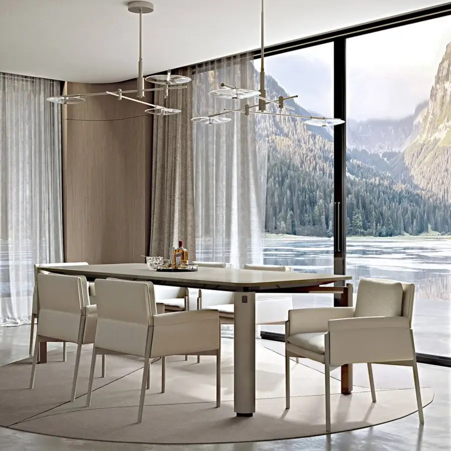 Exceptional Turri Zenit armchair with comfortable cushions and leather-clad structure in light beige fabric with matte finish