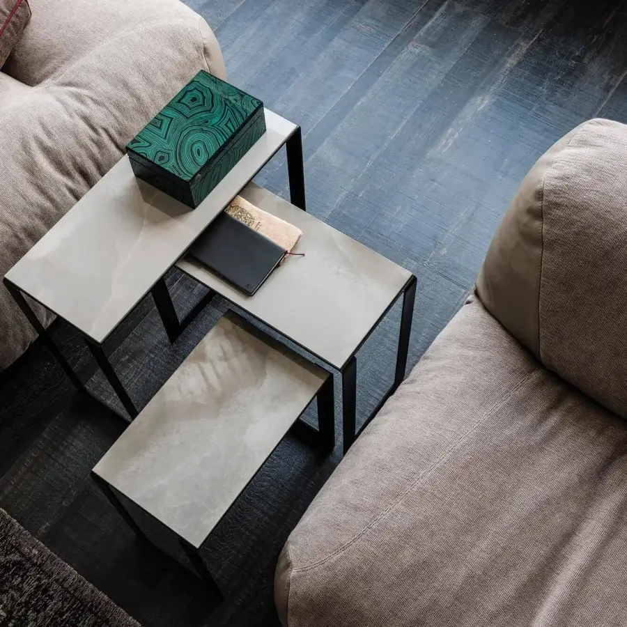 Distinguished Cattelan Italia Kitano side table with light grey ceramic showcasing refined marble finishes and a dark graphite painted steel base