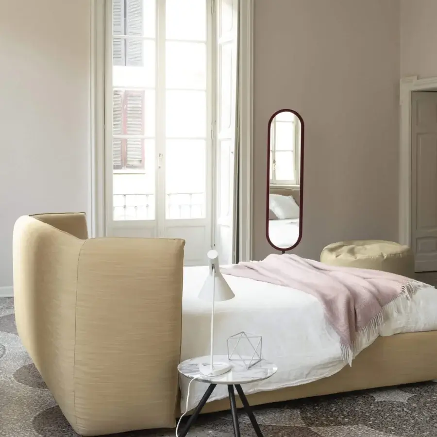 Lavish Bolzan Letti Jill bed with enveloping headboard upholstered in soft beige textile and firwood structure
