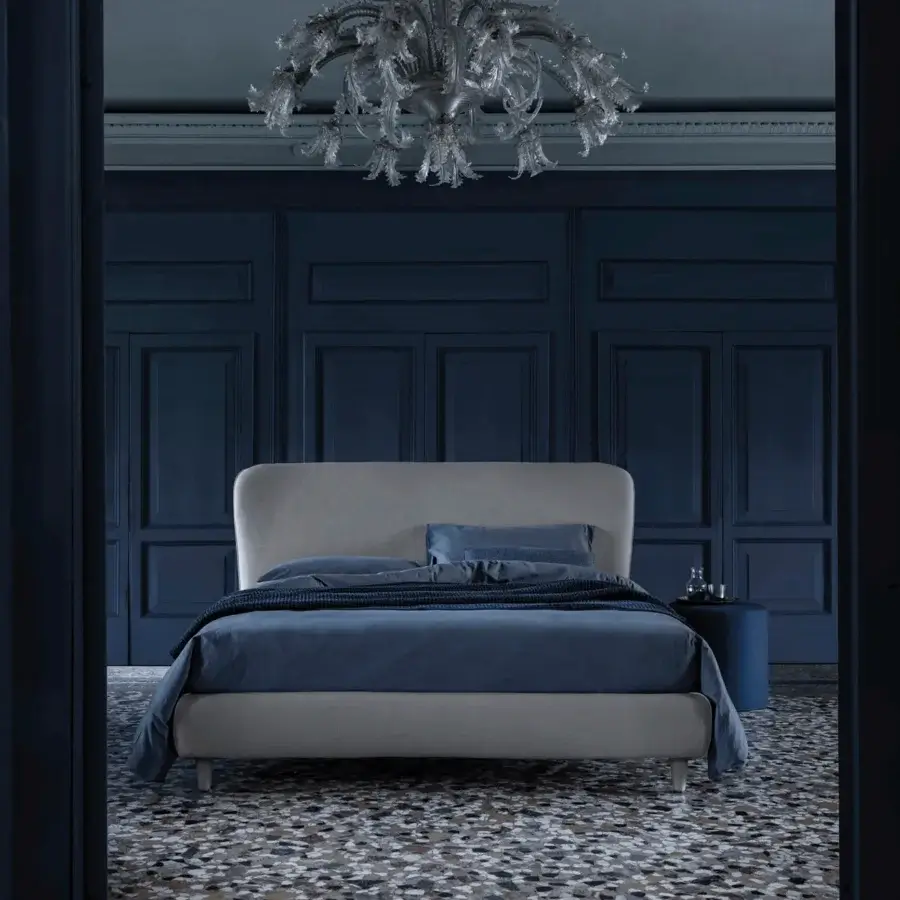 Distinguished Bolzan Letti Karol bed with light gray textile upholstery and gently curved headboard built with firwood