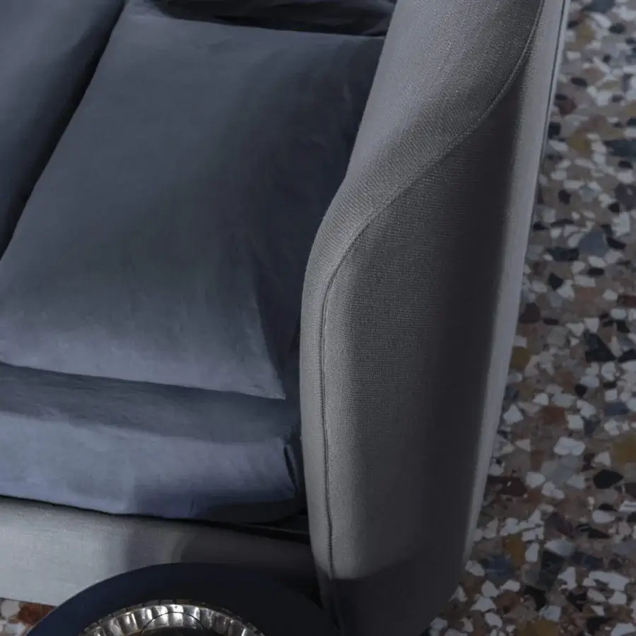 Exceptional Bolzan Letti Karol bed crafted in Italy with dark blue textile and curved tufted headboard