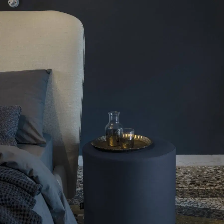 Timeless Bolzan Letti Karol bed with padded headboard upholstered in light beige textile and completely removable cover
