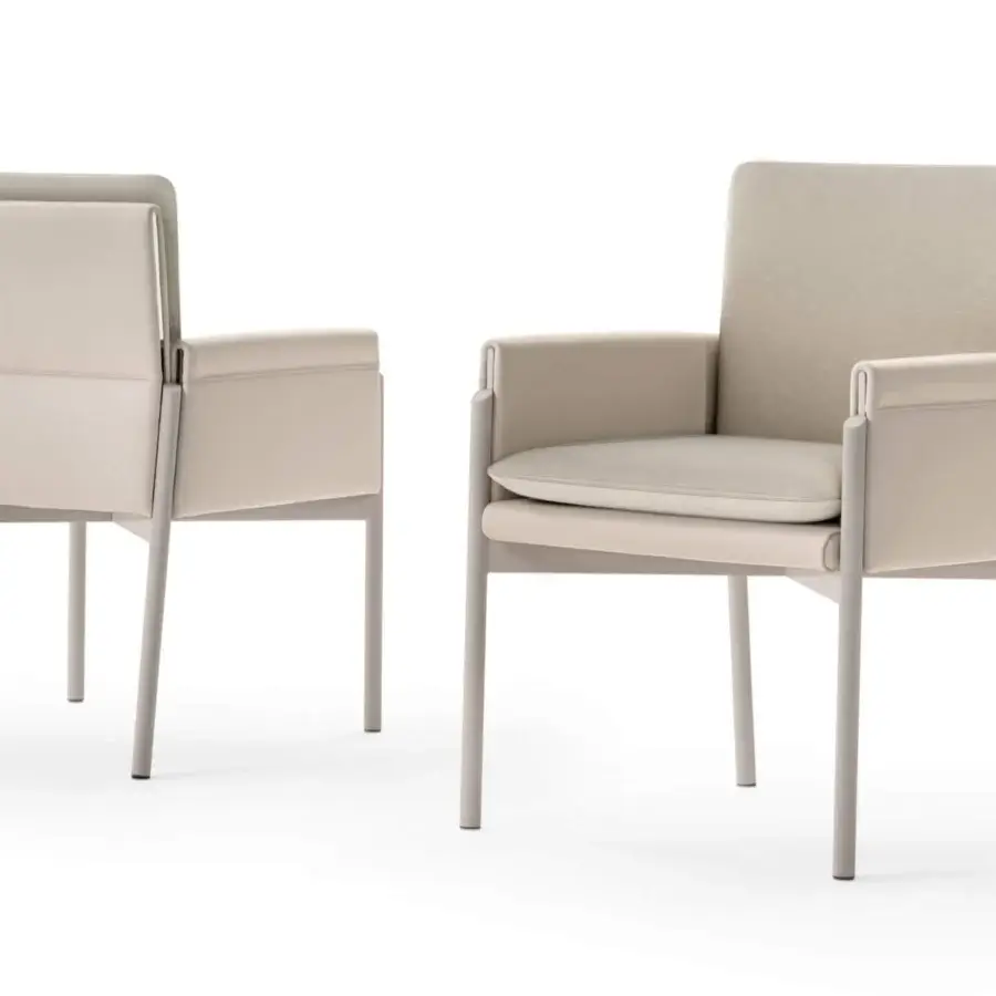 Distinguished Turri Zenit armchair with light beige leather and comfortable textile cushions exhibiting contemporary Italian design