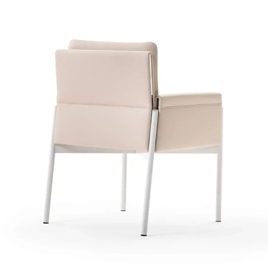 Exclusive Turri Zenit armchair with light beige leather upholstery and sleek white metal legs
