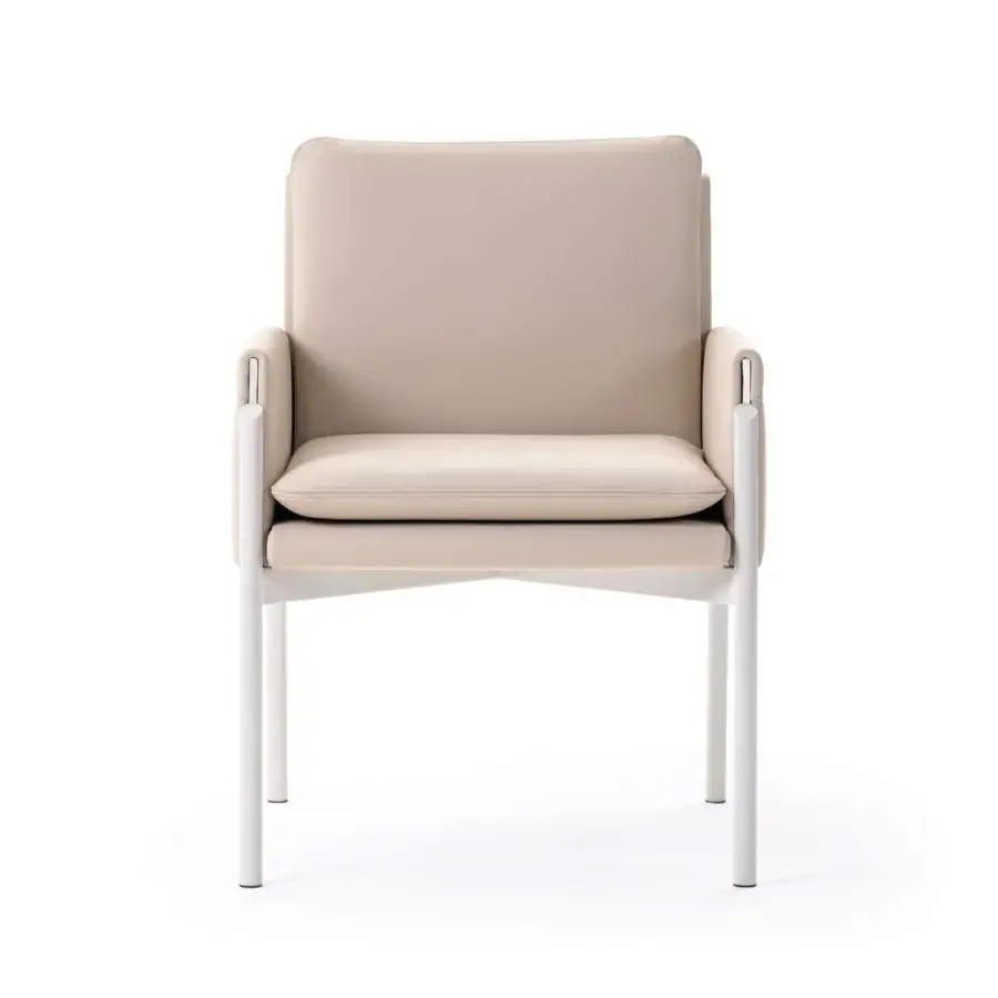 Distinguished Turri Zenit armchair with light beige leather and thin white metal legs embodies lightness