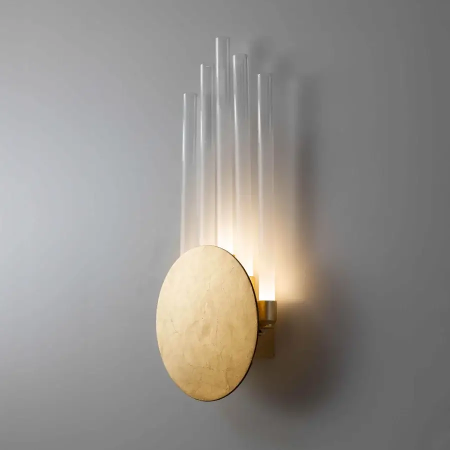 Exceptional Stillux Random wall lamp with five frosted pyrex glass tubes against a golden metal disc