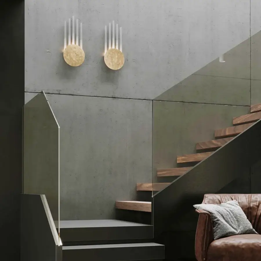 Superior Stillux Random wall lamp with a golden circular metal disc and five vertical frosted pyrex glass tubes