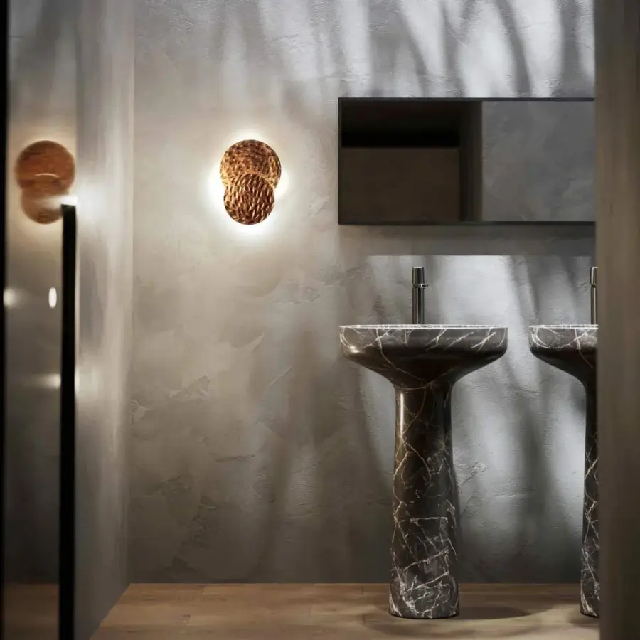 Elegant Stillux Random wall lamp with overlapping hammered metal discs in a warm bronze tone finish