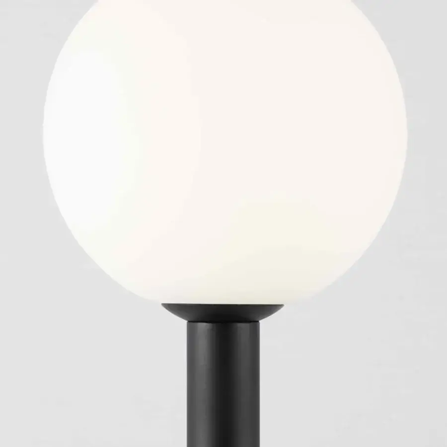 Superior Stillux Balloons floor lamp with spherical matt white glass shade and sleek matte black cylindrical metal stem
