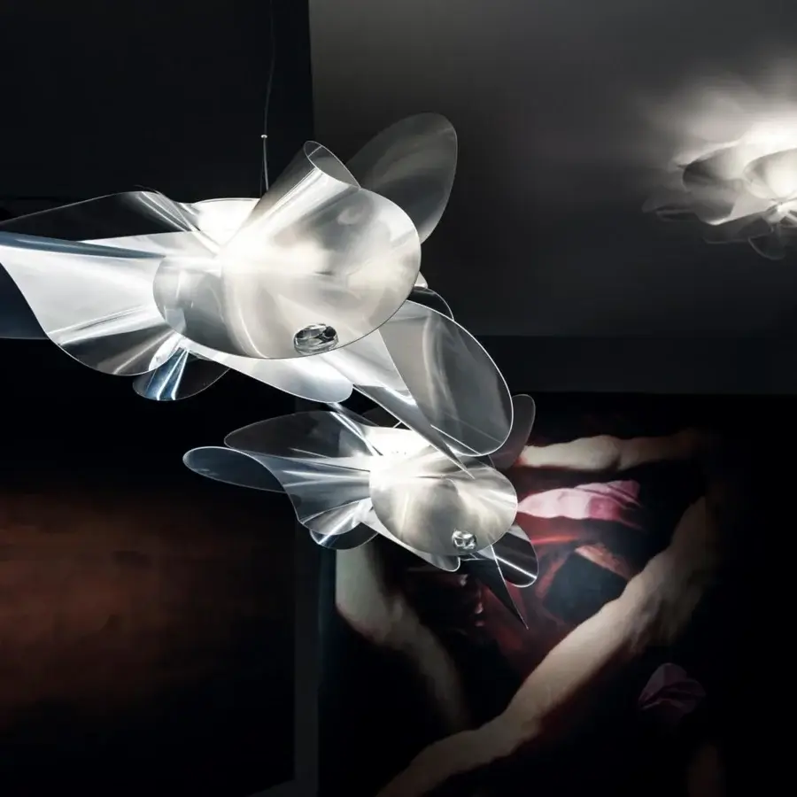 Elegant Slamp Étoile suspension lamp with layered petal-like components crafted in glossy translucent silvery-white Lentiflex®
