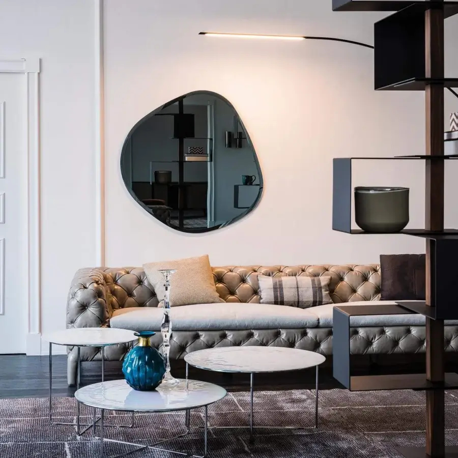 Distinguished Cattelan Italia Hawaii mirror with irregular organic shape and sleek dark frame crafted in Italy