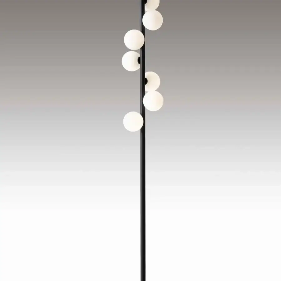 Harmonious Stillux Balloons floor lamp with seven matt white glass spheres connected to a black metal stem