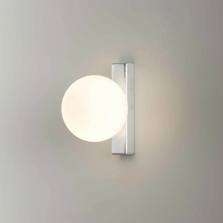 Superior Stillux Balloons wall lamp with a matt white glass sphere connected to a rectangular metal structure and silver-toned backplate