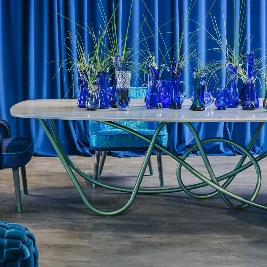 Captivating Turri Azul table with shaped light marble top and sinuous iridescent liquid painted metal base