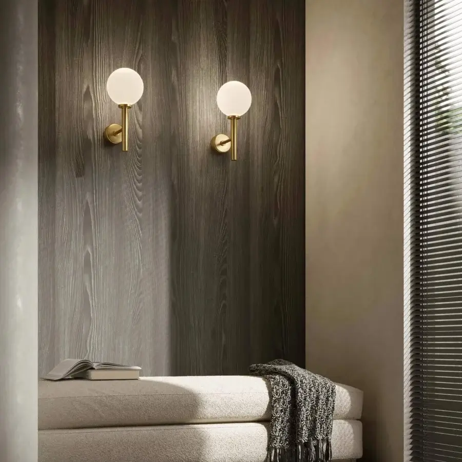 Superior Stillux Balloons wall lamp crafted in Italy with round matt white glass and brass-like metal supports