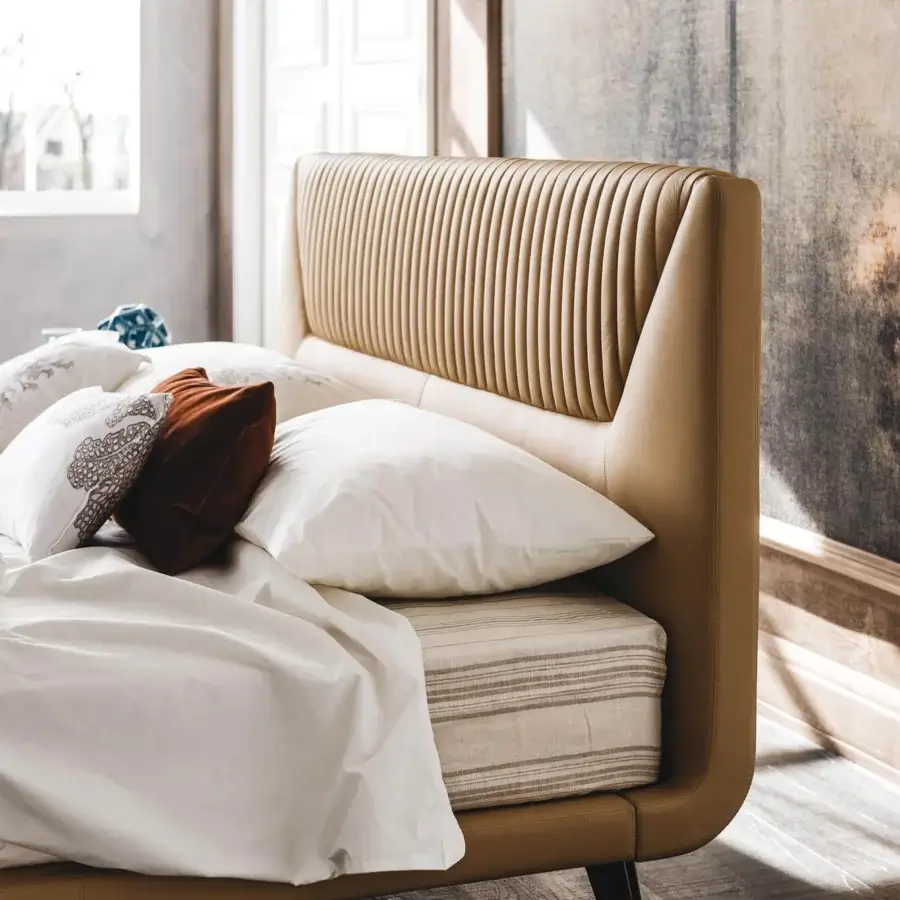 Superior Cattelan Italia Amadeus bed with tan leather-like upholstery and graphite embossed lacquered steel feet