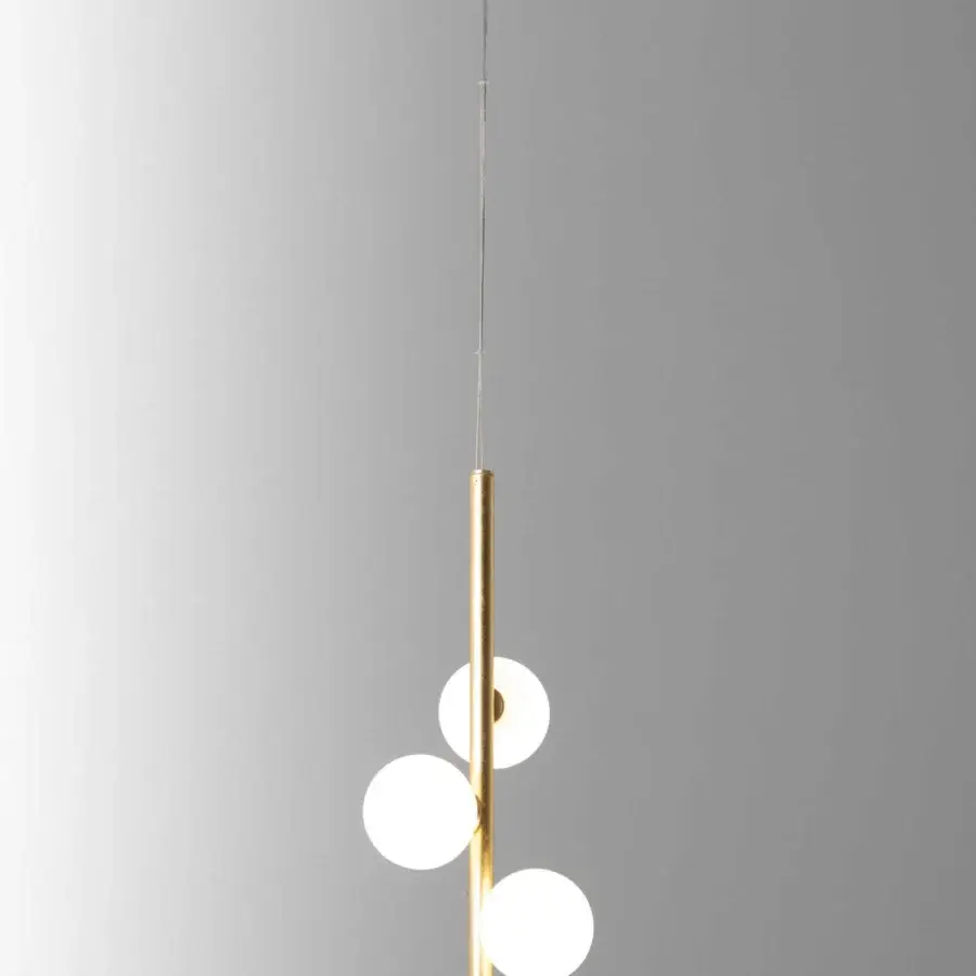 Elegant Stillux Balloons suspension lamp with three matt white glass spheres and glossy golden cylindrical stem connected by a silver cable