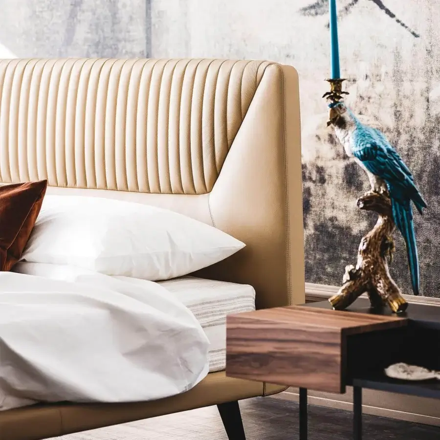 Distinctive Cattelan Italia Amadeus bed with light beige soft leather upholstery and graphite embossed lacquered steel feet