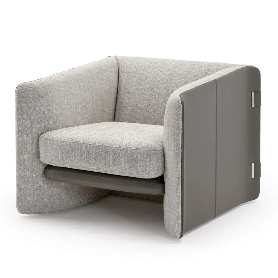 Elegant Turri Blossom lounge chair upholstered in light gray woven textile with medium gray synthetic side panels and metal details