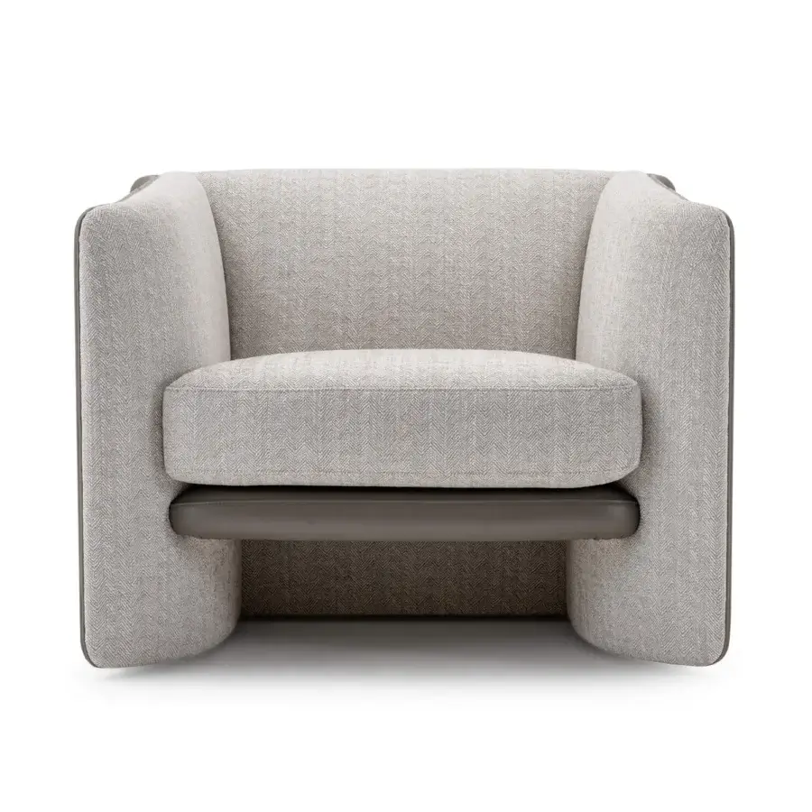 Superior Turri Blossom lounge chair upholstered in light gray woven textile with dark gray accents and parabolic metal details