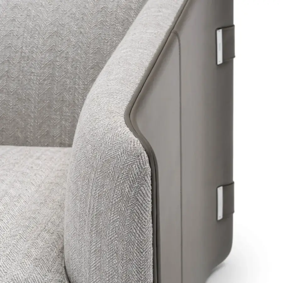 Superior Turri Blossom lounge chair with parabolic arches and woven light grey herringbone textile framed in smooth grey material