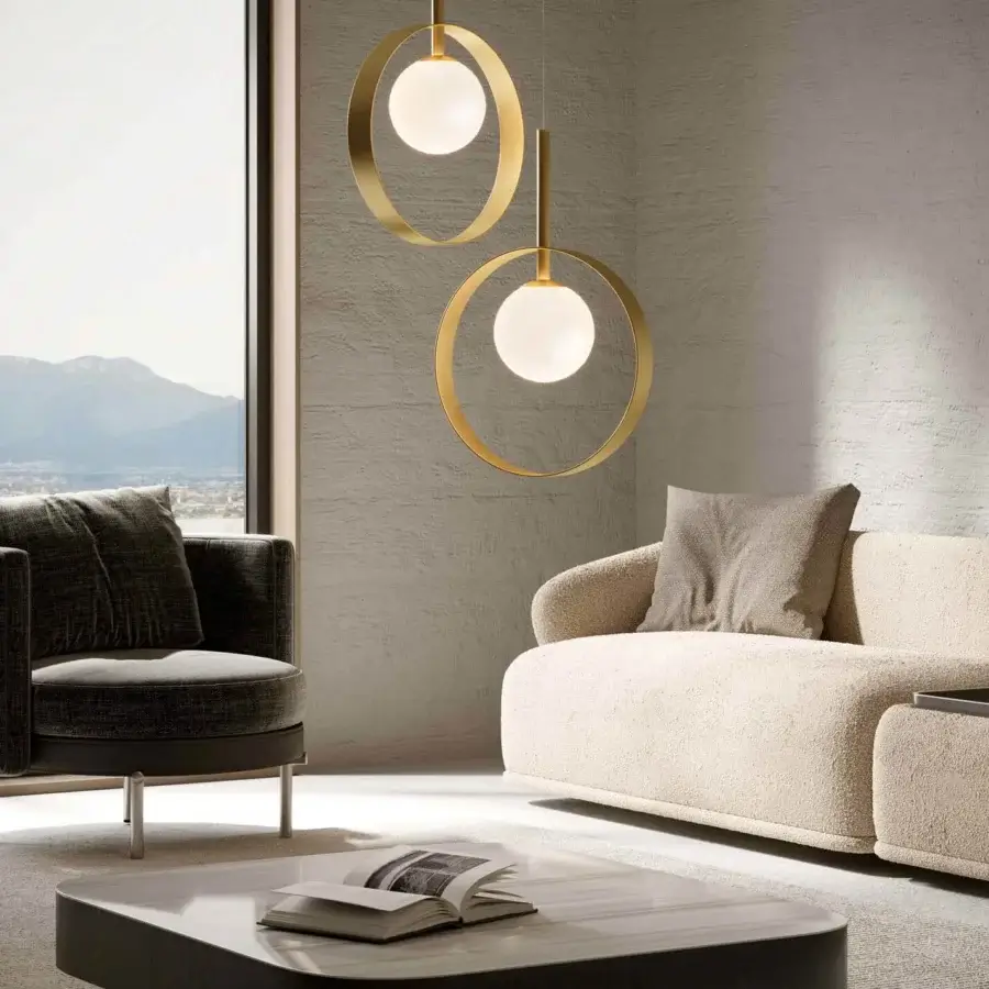 Superior Stillux Balloons suspension lamp with a gold-colored metal ring embracing a white glass diffuser and glossy finish