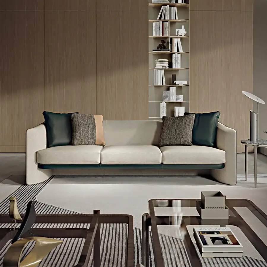 Superior Turri Blossom sofa with light beige textile upholstery, matte finish and dark brown accent cushions
