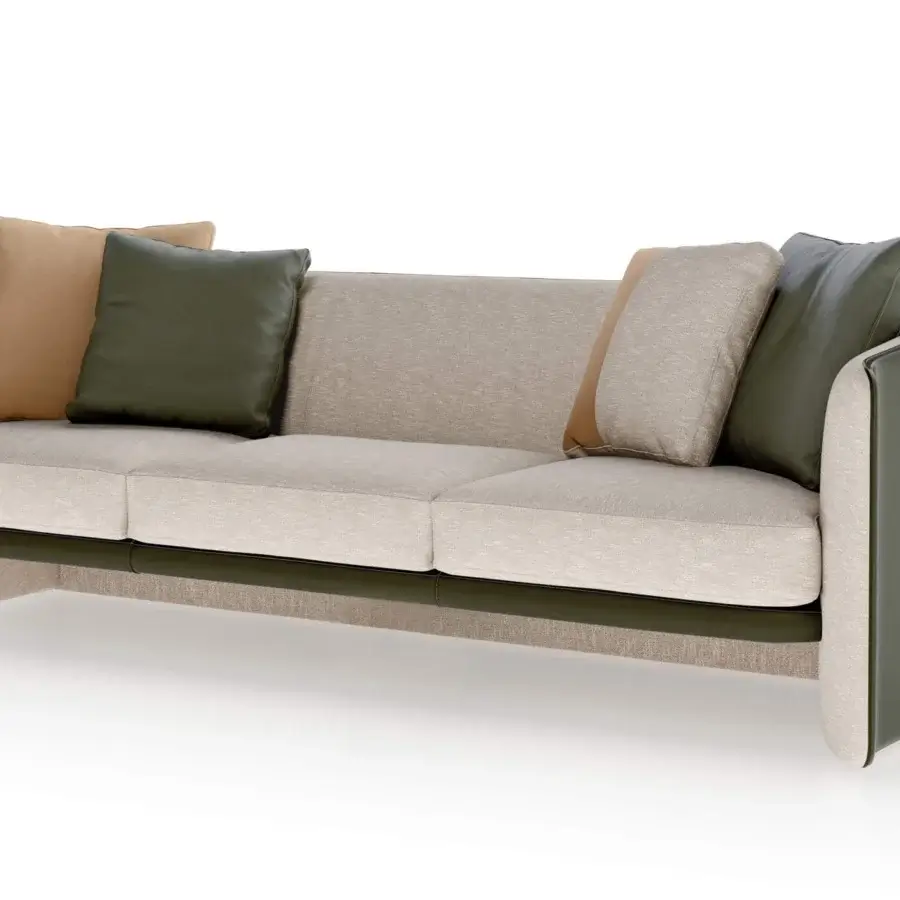 Elegant Turri Blossom sofa with light beige textile upholstery, dark green leather accents and metal details