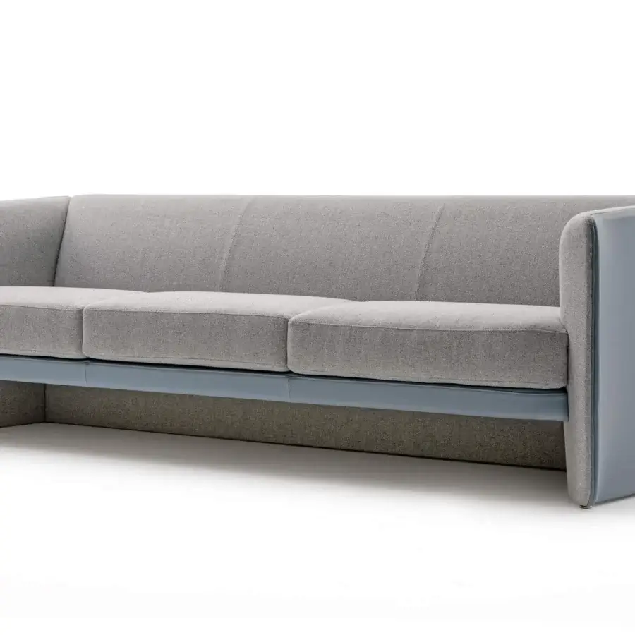 Exclusive Turri Blossom sofa with medium gray textile upholstery and light gray synthetic material, exhibiting a matte finish