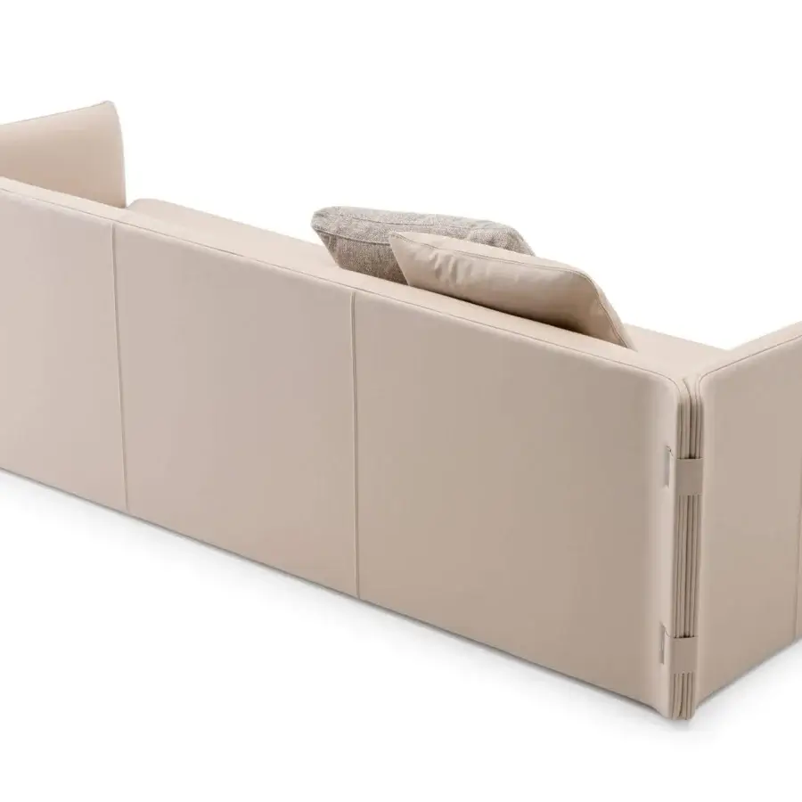 Distinguished Turri Blossom sofa with light beige textile upholstery, geometric lines and delicate metal accents