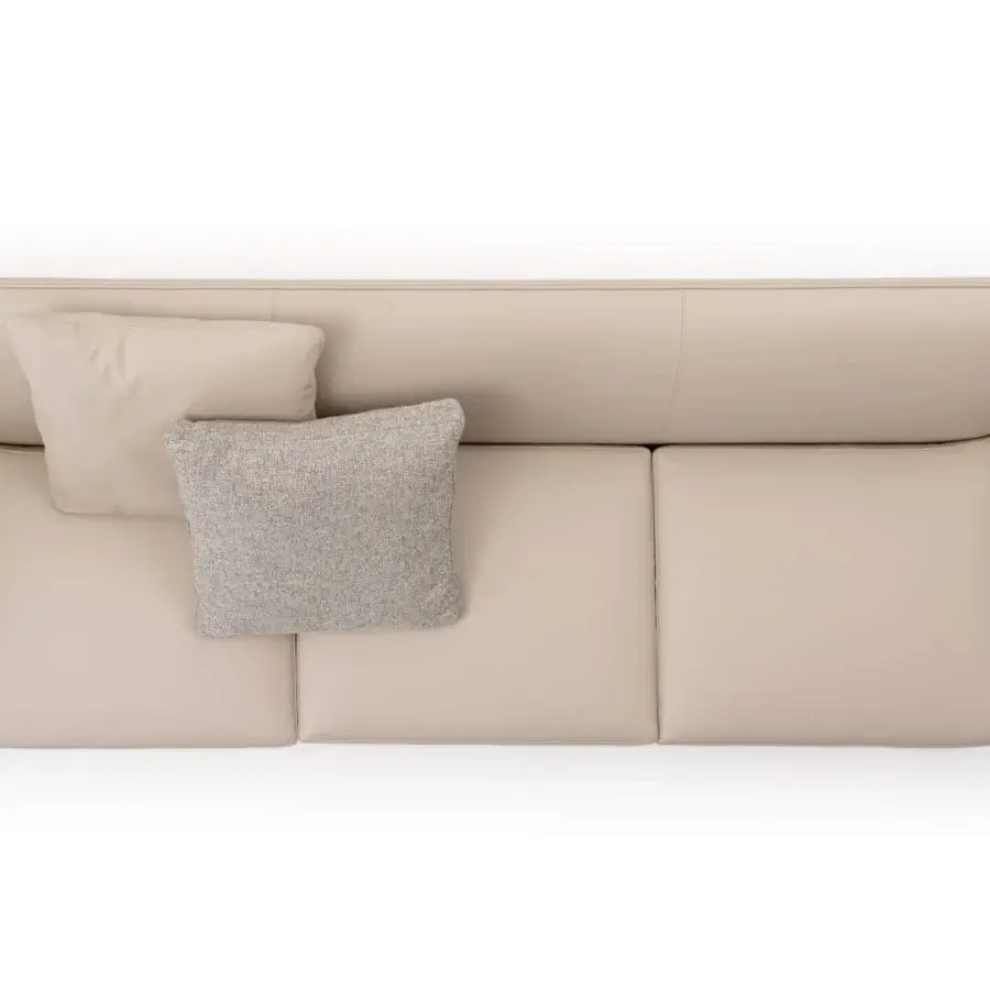 Captivating Turri Blossom sofa with light beige textile upholstery, parabolic arches and delicate metal details