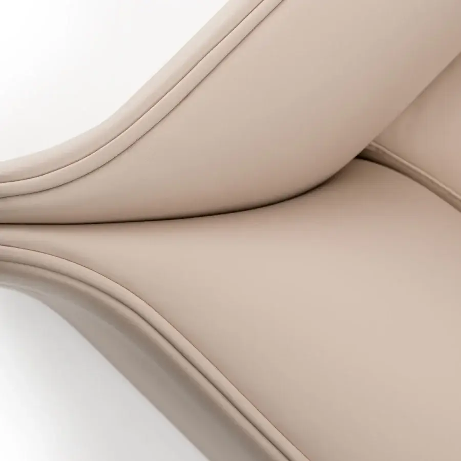 Distinguished Turri Blossom sofa with light beige leather upholstery, parabolic arches and refined metal details