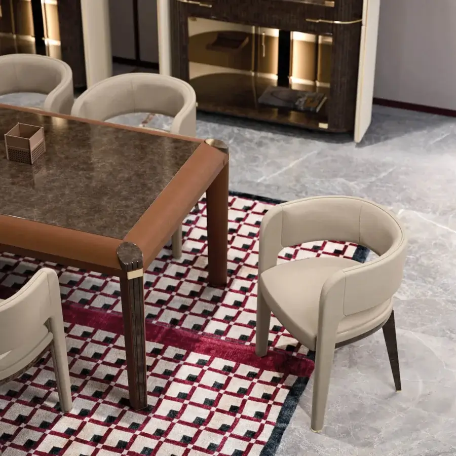 Distinguished Turri Eclipse armchair with light beige textile upholstery and dark wood legs crafted with light gold finish details