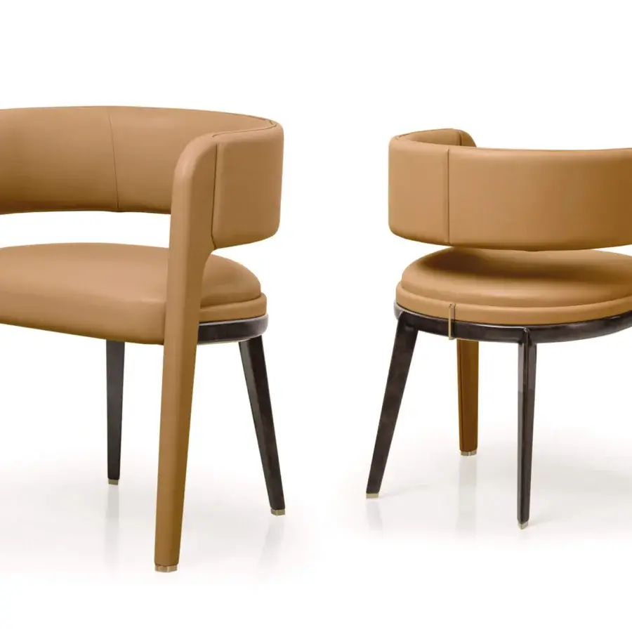 Exclusive Turri Eclipse armchair with light brown leather upholstery and light gold finished metal accents