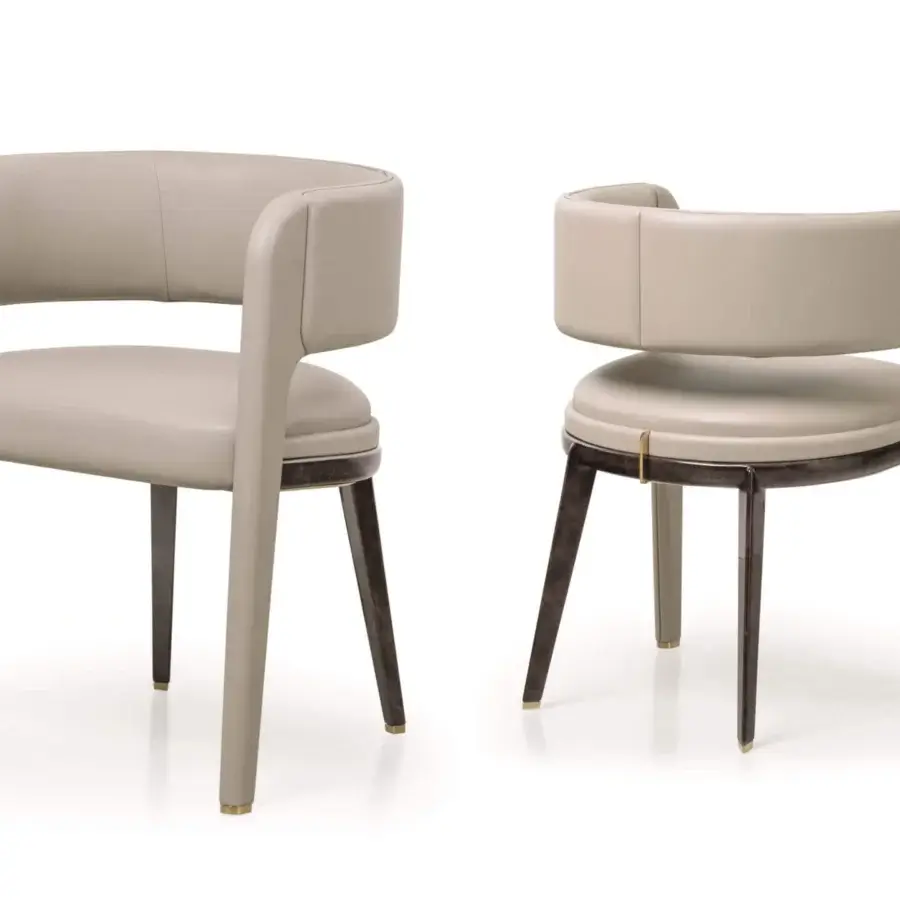 Superior Turri Eclipse armchair with embracing backrest, light beige fabric upholstery and gilded metal details crafted in dark wood