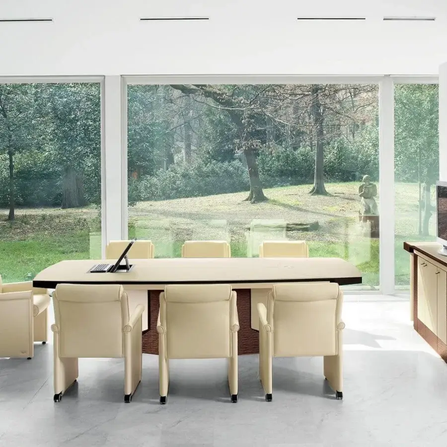 Exclusive Mascheroni Planet conference table crafted with light-colored multilayer wood and a darker textured base, bearing an engraved “Mascheroni srl Made in Italy” plate