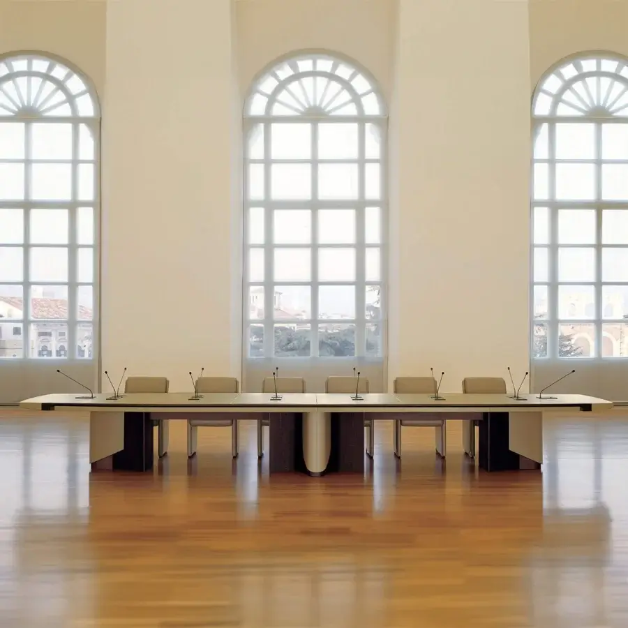 Superior Mascheroni Planet conference table crafted with wood, multilayer blockboard, and darker brown pedestal accents with a smooth matte finish
