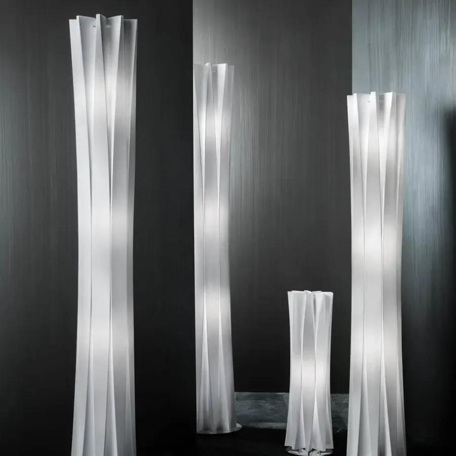 Distinguished Slamp Bach floor lamp with a slim form crafted in white Opalflex® and a fluted symmetrical radial structure