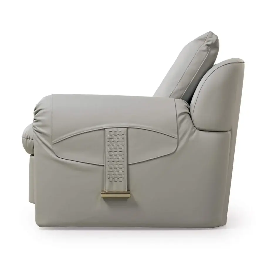 Distinguished Turri Eclipse lounge chair with sinuous lines, light gray upholstery and light gold metal details